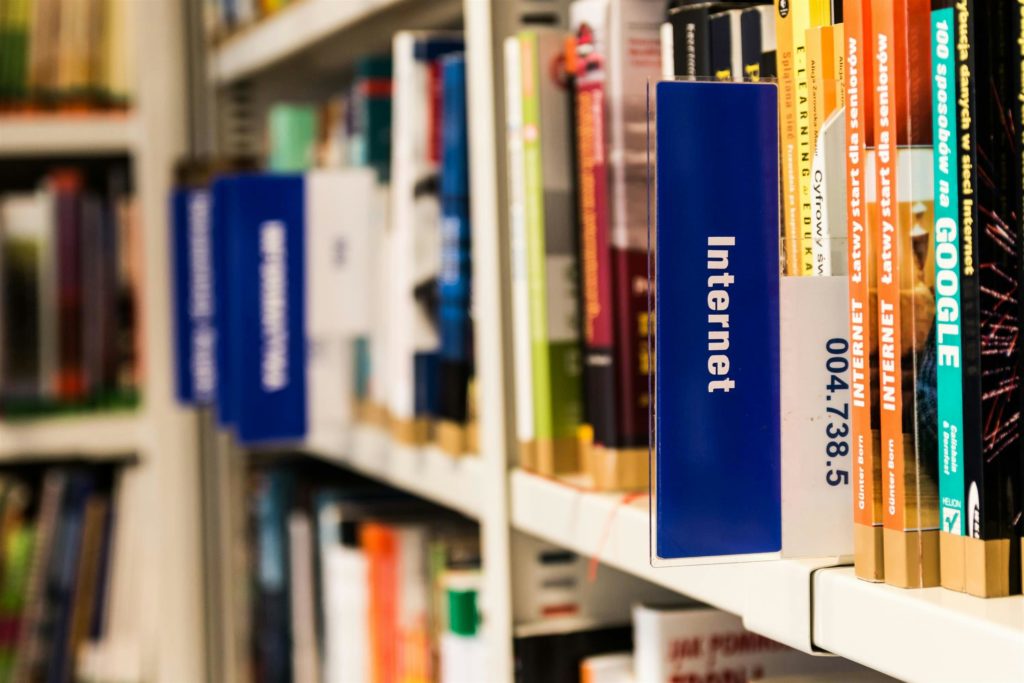 Books on a shelf in a library