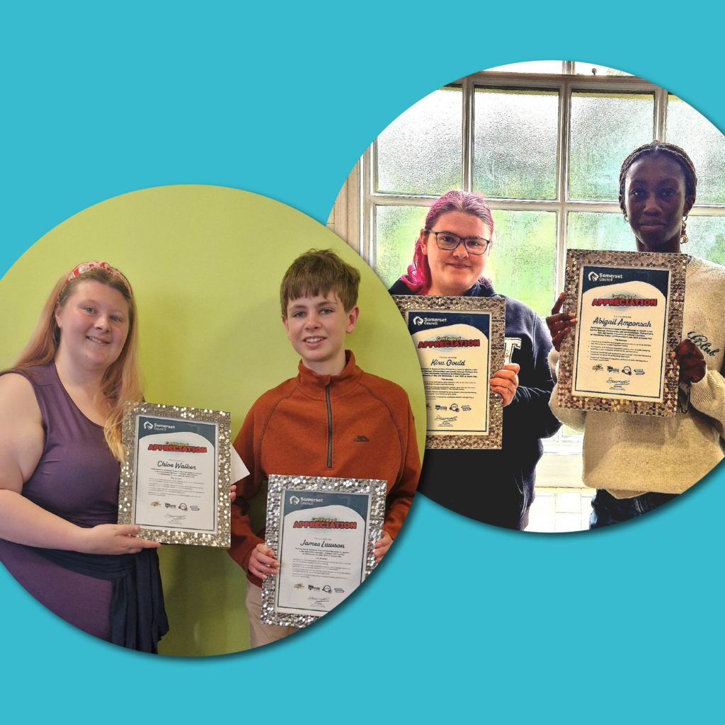 Chloe, James, Kira and Abi holding their certificates for their work sitting on interview panels